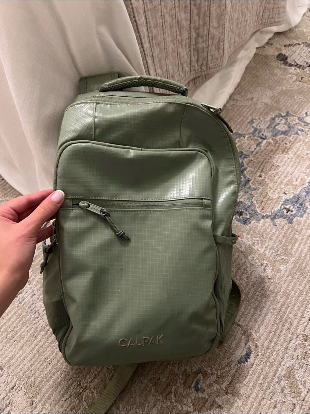 Calpak Olive Green Compact Travel Backpack for Men